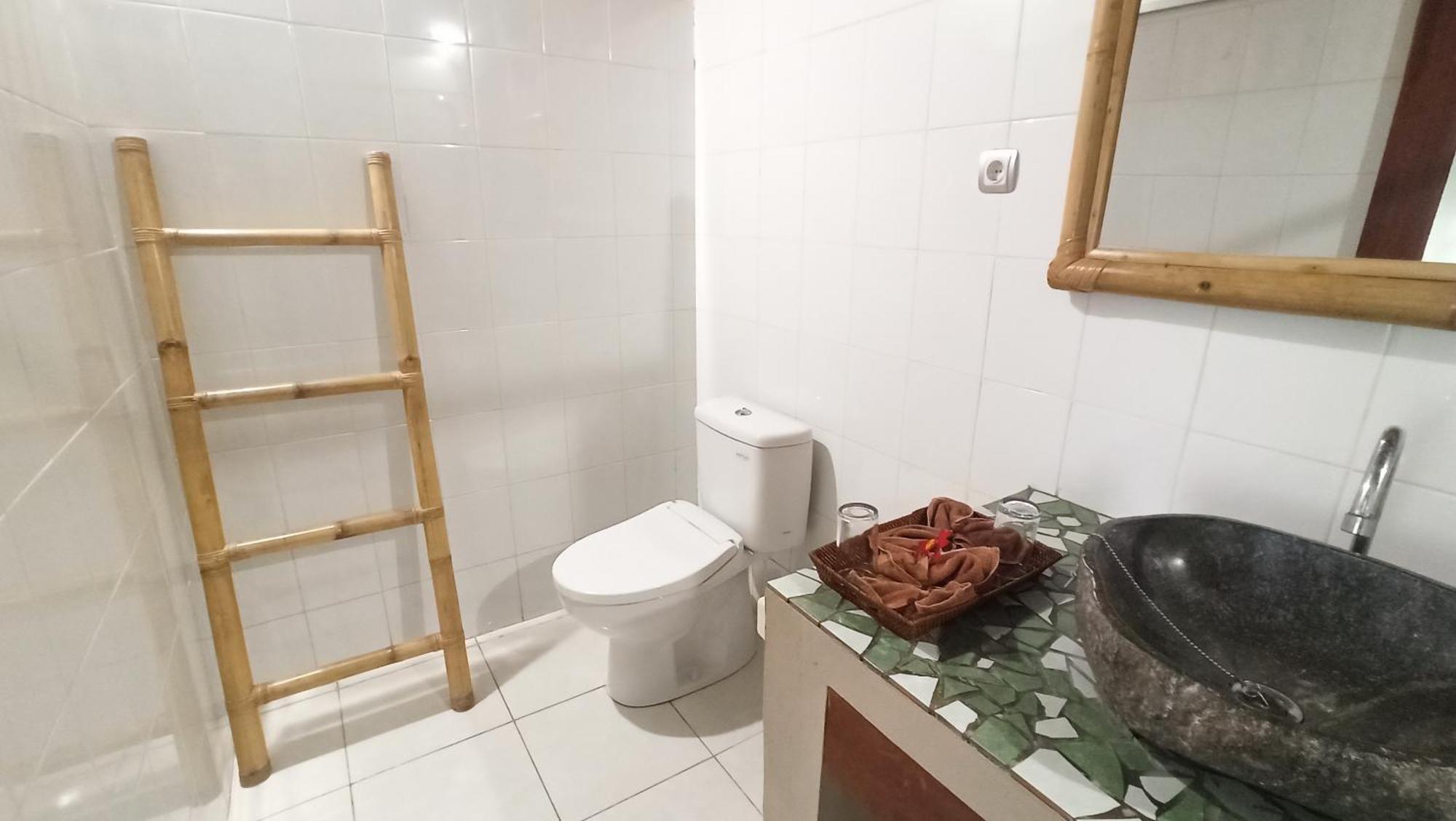 Mama Bella'S Retreat Bed & Breakfast Сенгиги Стая снимка